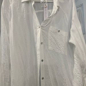 Never worn . Tried on only . No stains or tears.